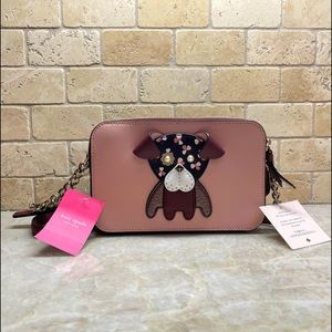 Kate Spade crossbody purse with dog design